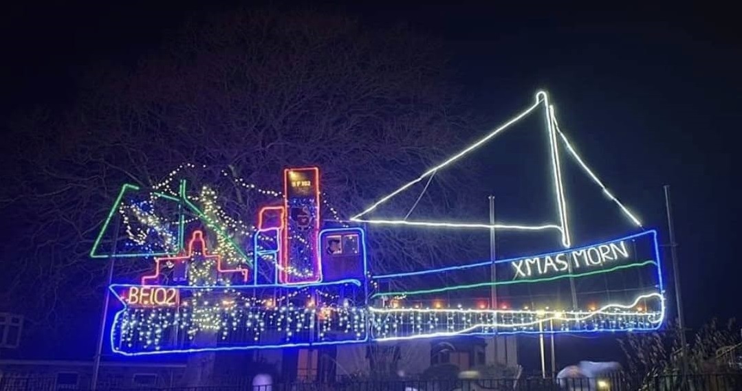Image of Cullen's Christmas lights featuring a fishing boat.