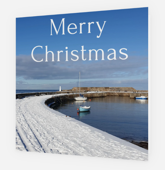 Cullen Christmas Card design showing harbour pier and lighthouse beacon